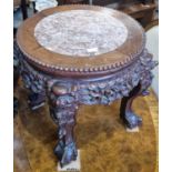 A Chinese darkwood jardiniere stand, the circular top with mottled red and white marble insert, 38cm