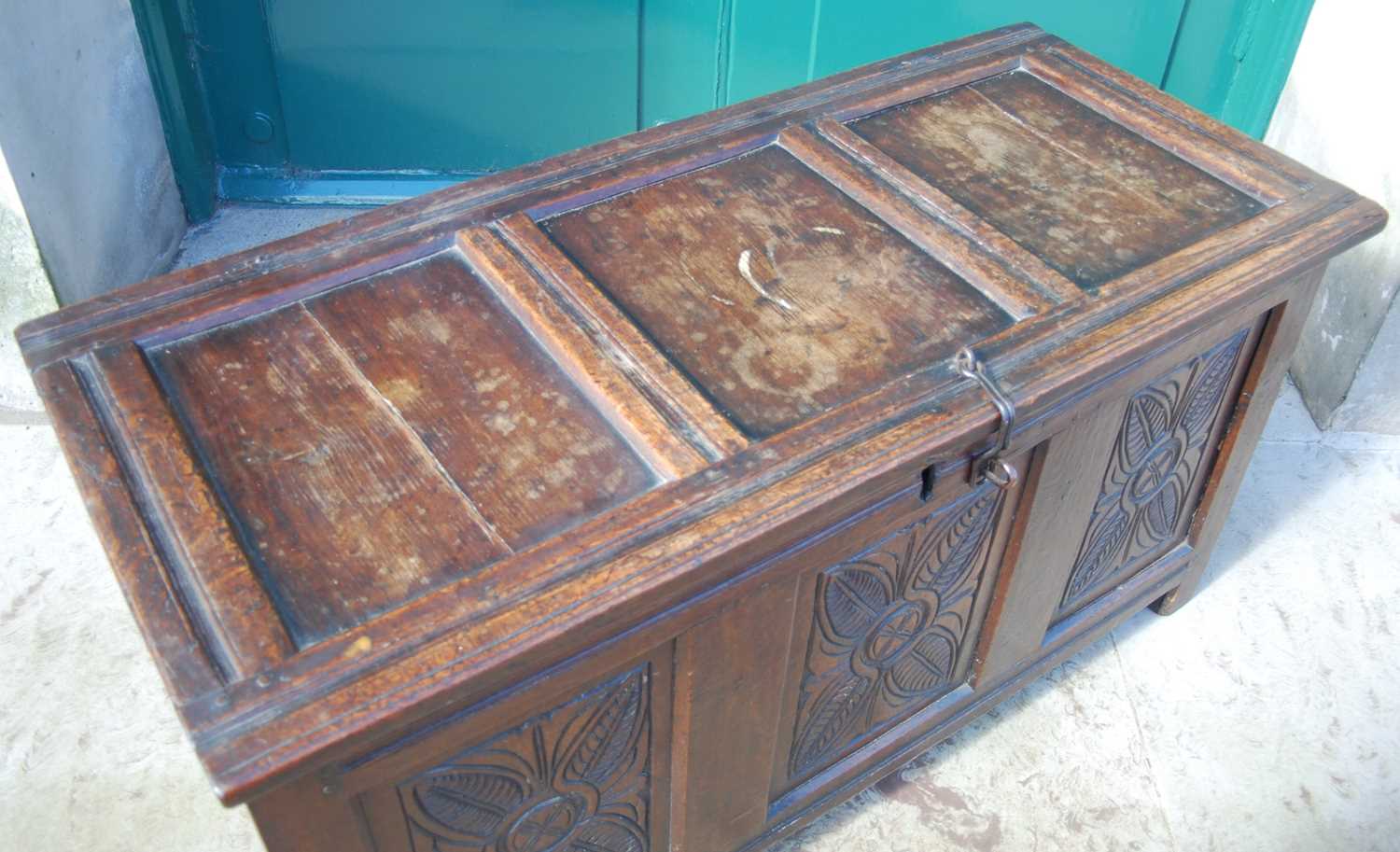 A George III oak coffer, the triple panel hinged cover over a triple panel front carved with three - Image 2 of 7