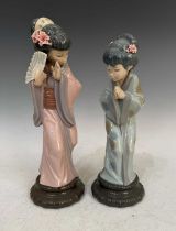 Two Lladro porcelain figures of Geisha girls, 'Sayonara' and 'Chrysanthemum' each with incised marks
