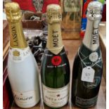 Three bottles; a Lanson white label champagne, Reims-France, 75cl, a Moët & Chandon champagne 1977