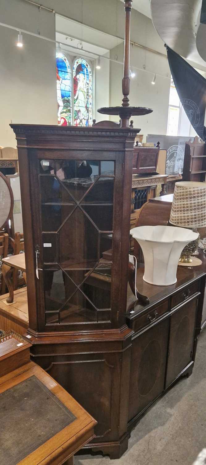 A group of furniture to include a reproduction side cabinet with two frieze drawers over two