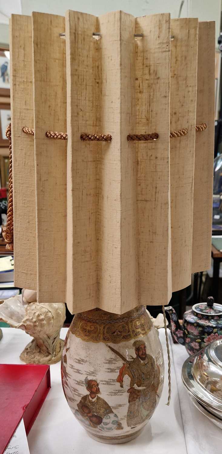 A Japanese Satsuma vase later mounted as a table lamp and shade, the vase 31cm high.