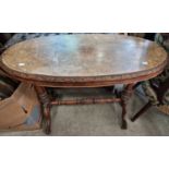 A Victorian walnut and marquetry inlaid oval table (distressed) 95cm wide.