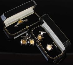 A group of gentlemans silver jewellery to include two pairs of cufflinks and a tie pin, all