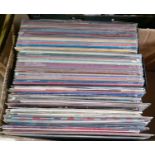 A box of assorted records, mainly classical, Billy Joel 'An innocent man', Boy George 'Modern