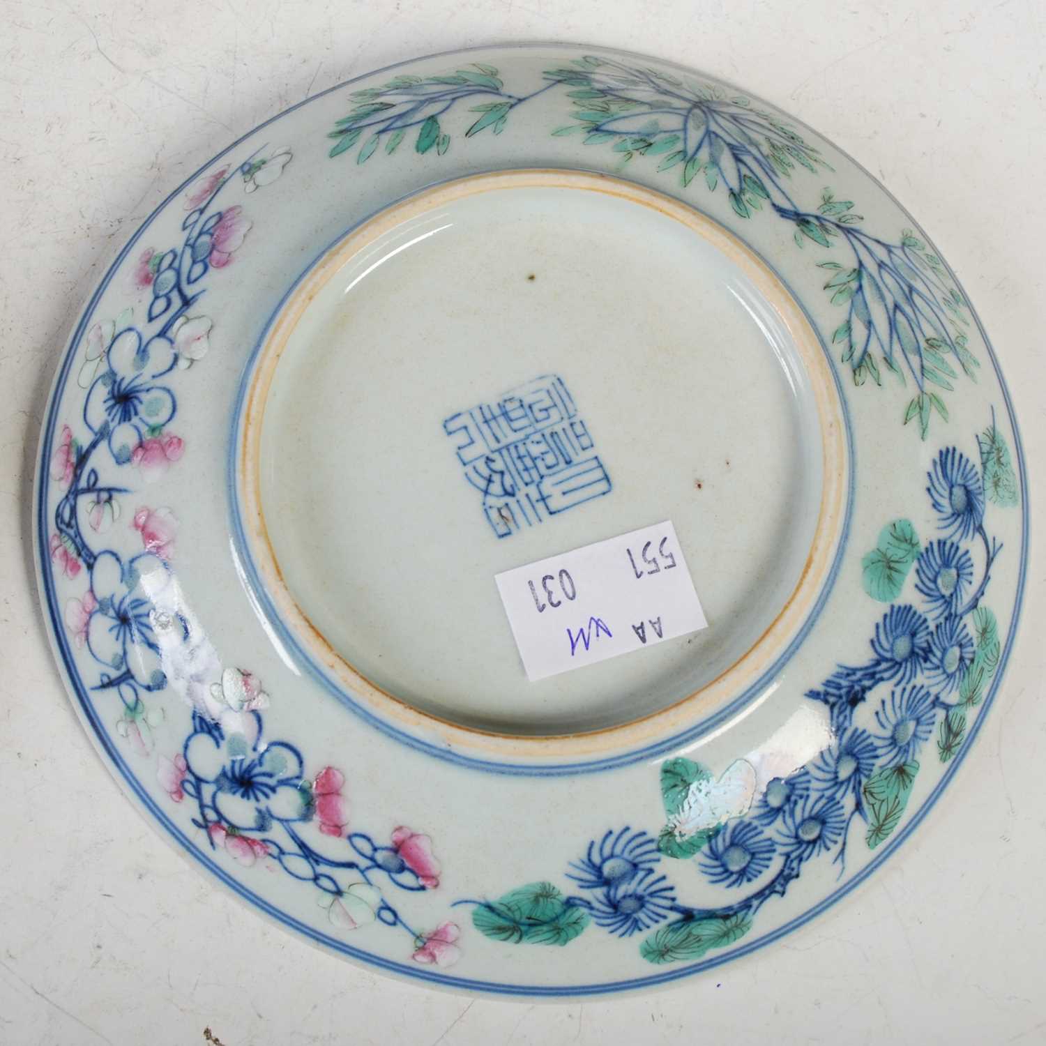 A collection of four assorted Chinese porcelain saucer dishes, Qing Dynasty, one decorated with - Image 7 of 7