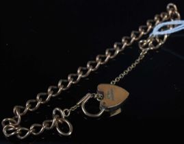 A 9ct gold bracelet with heart-shaped lock, gross weight 10.8 grams.