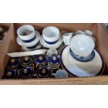 Two boxes of mixed wares to include a part Apilco French dinner set, two Lily Pond wall sconces,