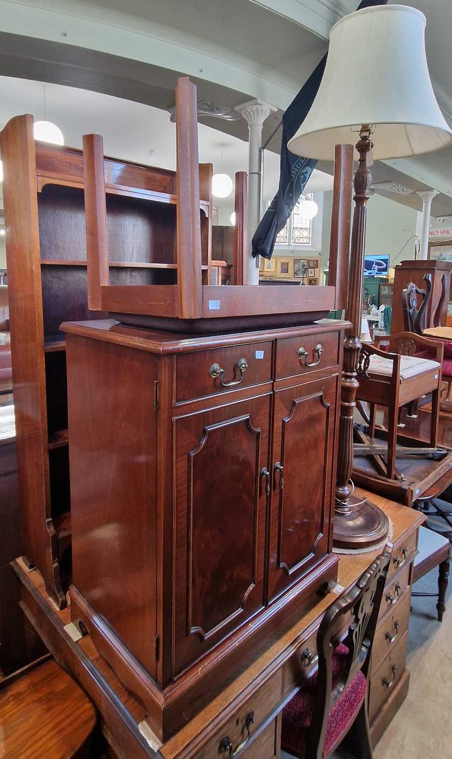 A group of furniture to include reproduction two door side cabinet, mahogany open bookcase,