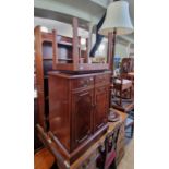 A group of furniture to include reproduction two door side cabinet, mahogany open bookcase,