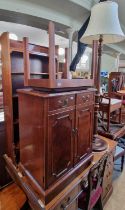 A group of furniture to include reproduction two door side cabinet, mahogany open bookcase,