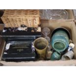 A box of assorted mixed wares to include vases, toby jugs, brass shell casing, boxed Queens