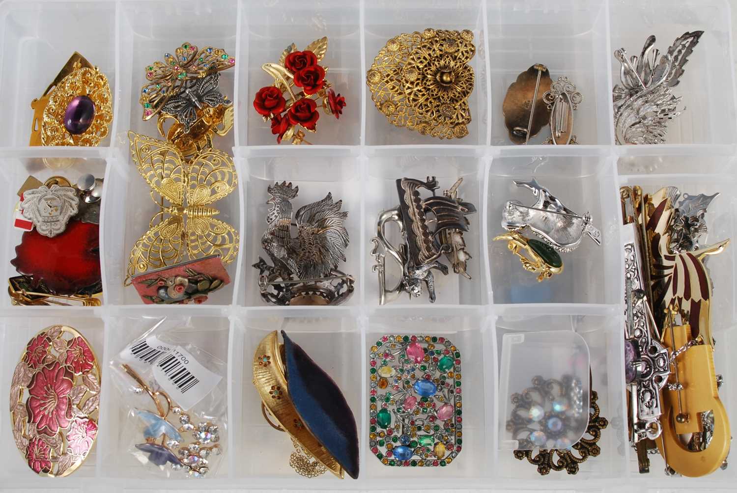Three boxes of assorted costume jewellery to include brooches, necklaces, pendants etc. - Image 4 of 4
