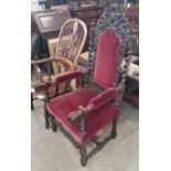 An antique stained oak throne / hall chair, in the Jacobean style with claret coloured velvet