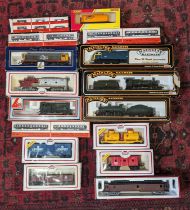 Four boxes of assorted Double OO gauge railway items to include examples by Mainline; Lima;