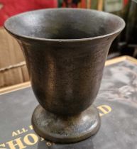 An Antique metal mortar, 10cm high.