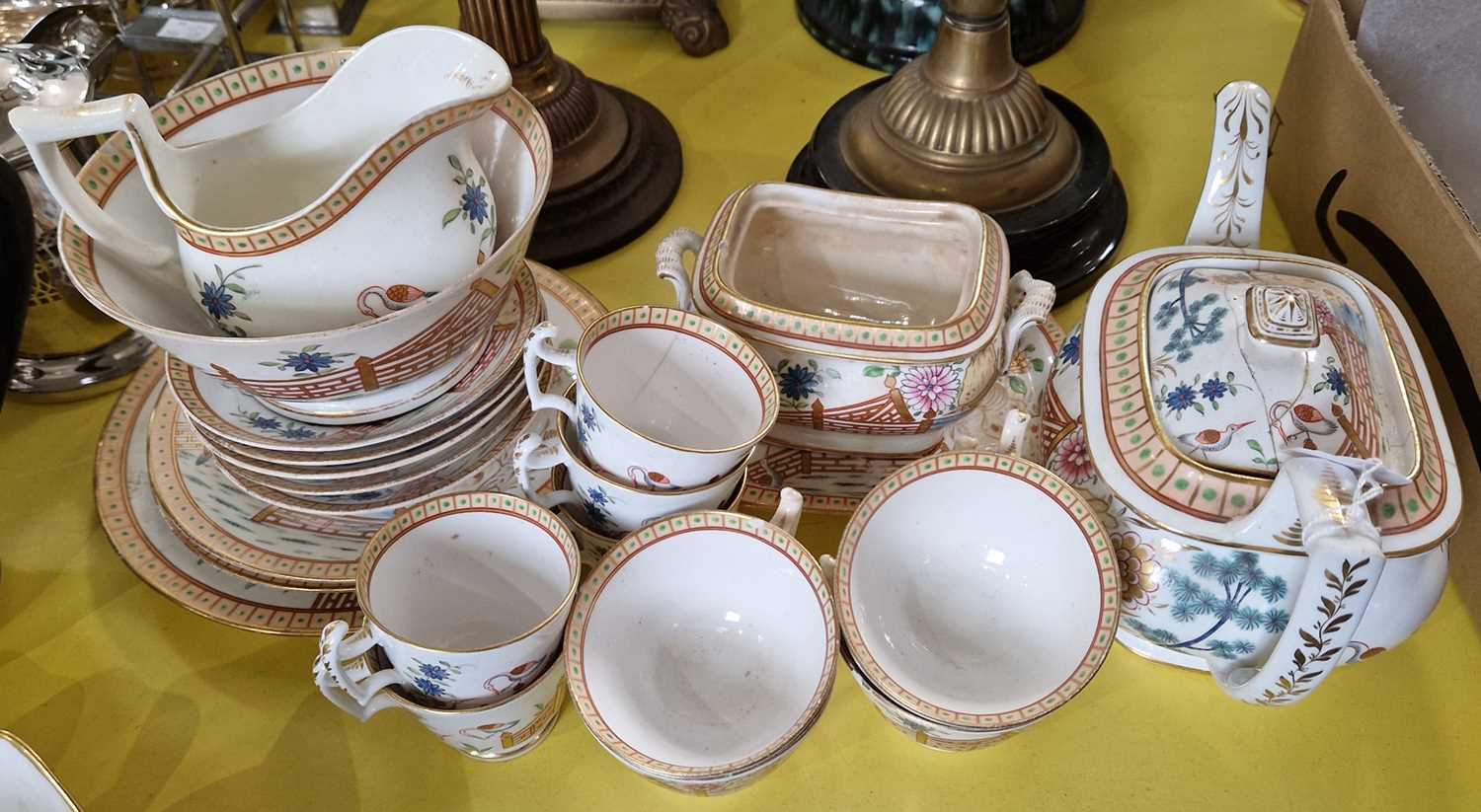 A 19th century hand-painted part teaset with Chinoiserie decoration.