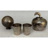 A group of Eastern white metal wares to include an apple shaped box and cover, a circular shaped box