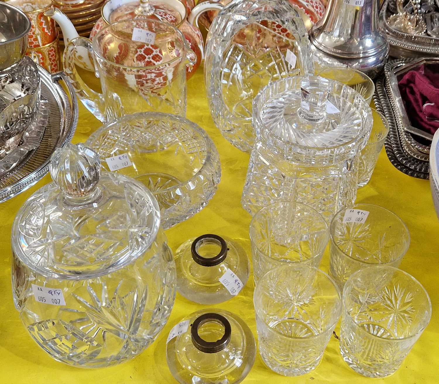 A collection of assorted cut glassware to include whisky tumblers; two jars and covers; jug;