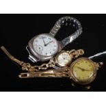 A vintage ladies 9ct gold wristwatch, the oval dial with baton numerals, gross weight 8.4 grams,