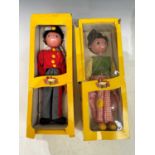 Two boxed vintage Pelham puppets, Marlborough wilts, Dutch boy SS1, and Fritzi SS7.