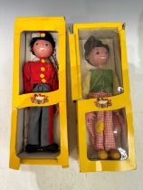 Two boxed vintage Pelham puppets, Marlborough wilts, Dutch boy SS1, and Fritzi SS7.