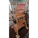 A vintage dolls folding highchair, 64cm high.