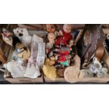 Three boxes of assorted mixes wares to include a varied collection of vintage dolls, a pair of Wally