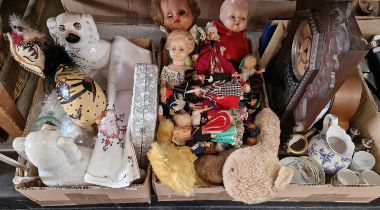 Three boxes of assorted mixes wares to include a varied collection of vintage dolls, a pair of Wally