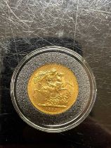 A Victorian gold sovereign dated 1899.