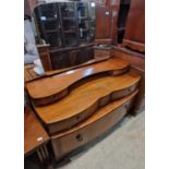 A nest of three mahogany occasional tables, together with an early 20th century walnut mirror-back