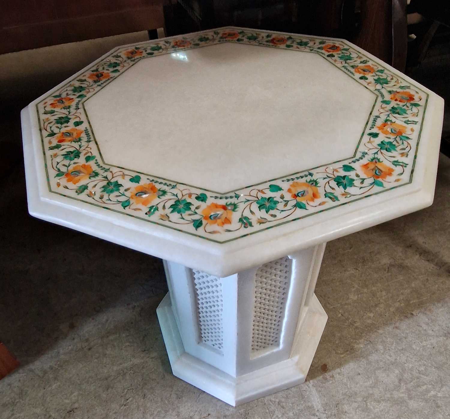 An Indian white marble malachite, mother of pearl and orange agate inlaid octagonal shaped