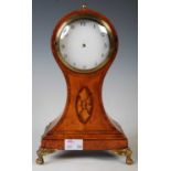 A 19th century satinwood, marquetry and gilt metal mounted mantle clock, with black and white