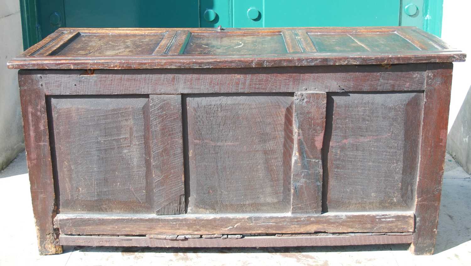 A George III oak coffer, the triple panel hinged cover over a triple panel front carved with three - Image 7 of 7