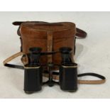 A late 19th/early 20th century leather cased set of Carl Zeiss Jena D.R.P. Feldstrecher Vergr +8