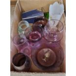 A box of assorted coloured art glassware.