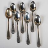 Seven 19th century Edinburgh silver teaspoons with bright cut detail, engraved with initials, 4.2