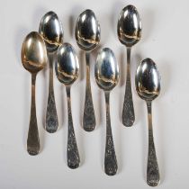 Seven 19th century Edinburgh silver teaspoons with bright cut detail, engraved with initials, 4.2