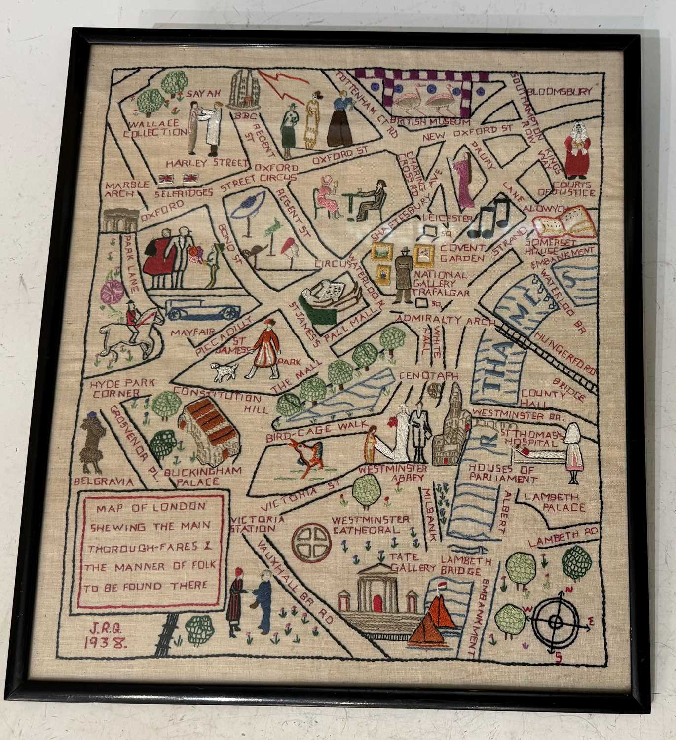 An early 20th century needlework picture, titled 'Map of London - showing the main thoroughfares and