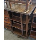 An early 20th century oak revolving square bookcase, 87cm high.