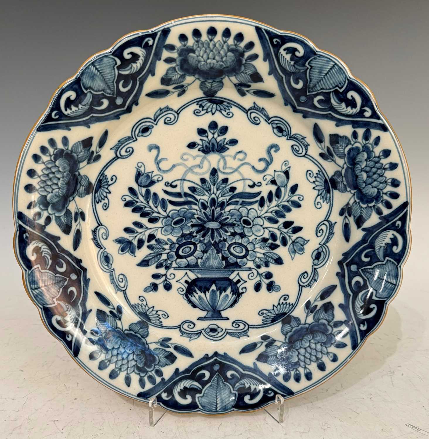 Delft floral pattern blue and white wall dish, with scalloped edge, the underside with Makkun