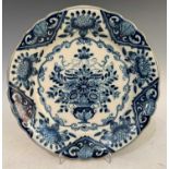 Delft floral pattern blue and white wall dish, with scalloped edge, the underside with Makkun