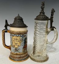 A Mettlach German pottery Beer Stein with pewter hinged cover, decorated with two medieval figures
