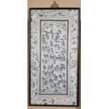 A Chinese silkwork panel / kesi, worked in coloured threads to depict various figures, flowers and