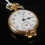 A Continental yellow metal fob watch, stamped 18K, the inner cover with presentation inscription,