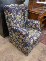 Wing-back armchair