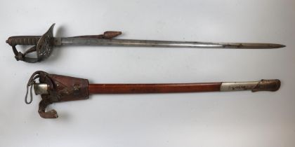 Antique sword by Wilkinson in scabbard