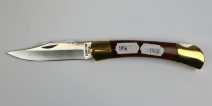 Mahogany and brass locking knife