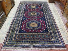 Red & blue patterned rug - Approx size: 350cm x 180cm