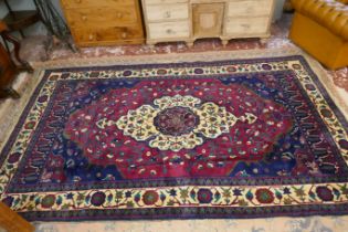 Large red patterned rug - Approx size: 330cm x 190cm